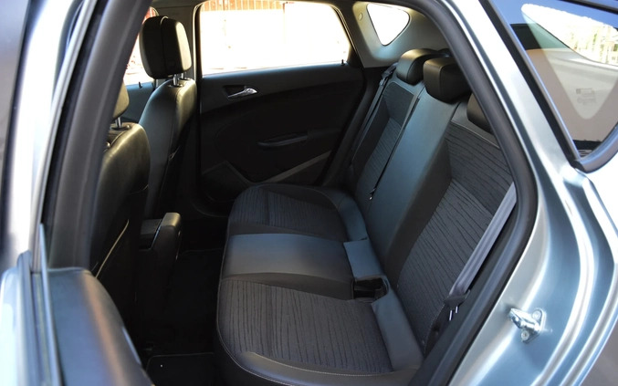 Opel Astra cena 32900 przebieg: 180000, rok produkcji 2014 z Płock małe 562